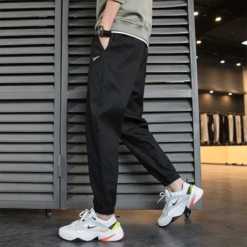 2020 Naujas Sporto Pants Mens Mados Vientisos Spalvos Streetwear Raišteliu Kišenėje Sportinės Kelnės Atsitiktinis Pluošto Kojų Kelnės